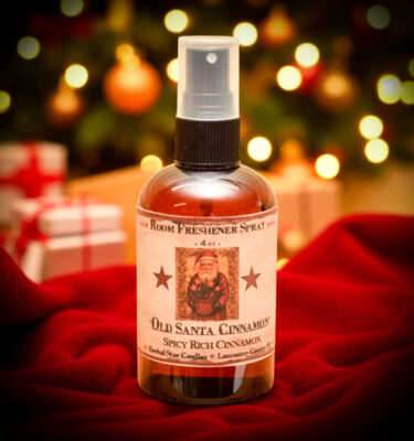 Old Santa Cinnamon Room Spray – 4 oz amber bottle with folk art Santa label and spicy cinnamon fragrance