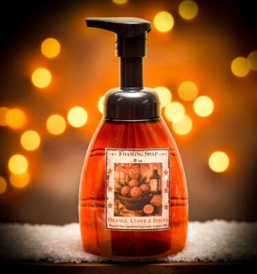 “Orange Clove and Spices foaming hand soap bottle with festive label by Herbal Star Candles, Lancaster County PA”
