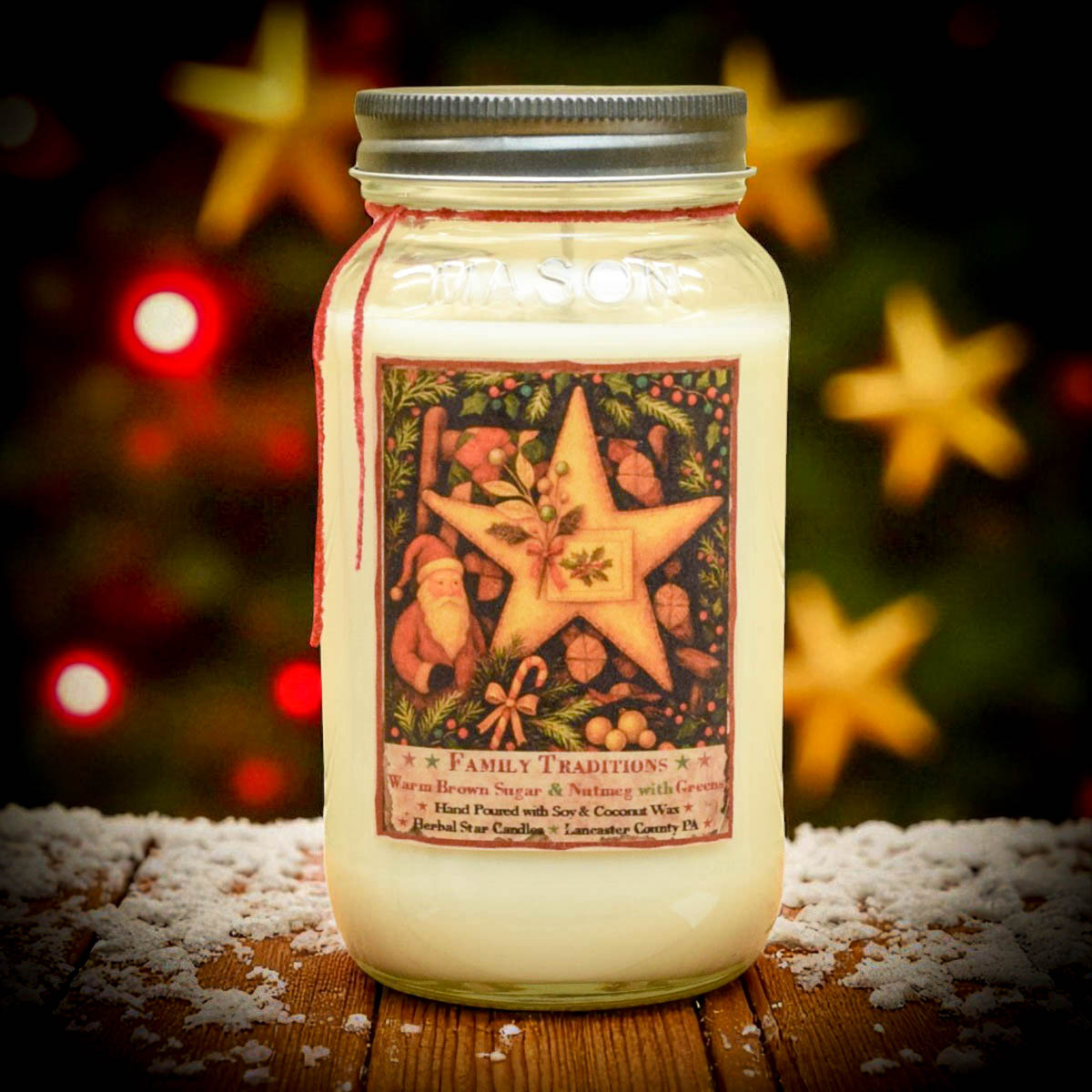 Family Traditions 24 oz Candle, formerly Christmas Traditions, in mason jar with folk-art holiday label. Scent of brown sugar, nutmeg, and pine