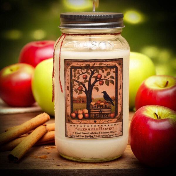 Spiced Apple Harvest 24 oz candle with folkart apple tree and crow label in mason jar with pewter tin lid