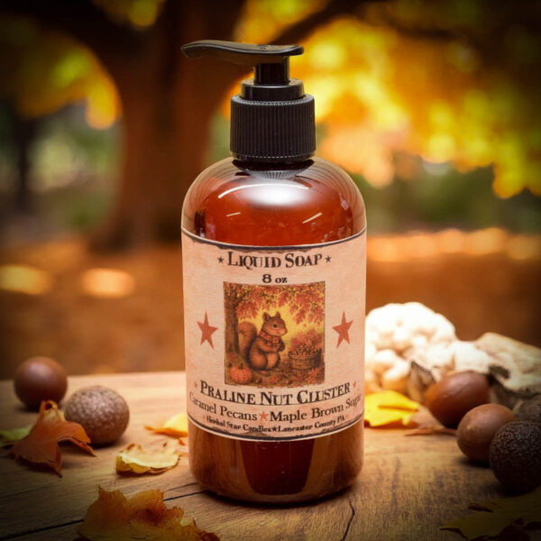 Praline Nut Cluster liquid hand soap bottle with squirrel-themed label and cozy scent of pecans, pralines, caramel, and vanilla