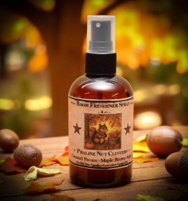 Praline Nut Cluster Room Spray with squirrel-themed label and warm scent of pralines, pecans, caramel, and vanilla