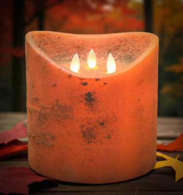 6x6 size Extra-large bittersweet orange flameless candle with three moving flame wicks and pumpkin scent
