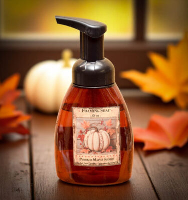 Pumpkin Maple Scones foaming hand soap bottle with rustic fall label, set among pumpkins and seasonal decor
