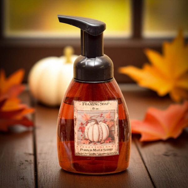 Pumpkin Maple Scones foaming hand soap bottle with rustic fall label, set among pumpkins and seasonal decor