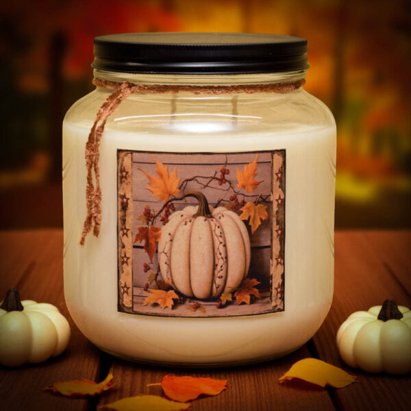 64 oz Pumpkin Maple Scones double-wick candle in mason jar with rustic label and antique pewter lid, surrounded by cozy autumn accents.