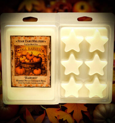 Harvest star-shaped wax tarts with pumpkin pecan cinnamon roll scent in fall-themed packaging