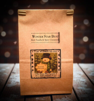 10 oz kraft bag of 12 Winter Star Dust wax tarts with snowman label, scented with vanilla and cinnamon
