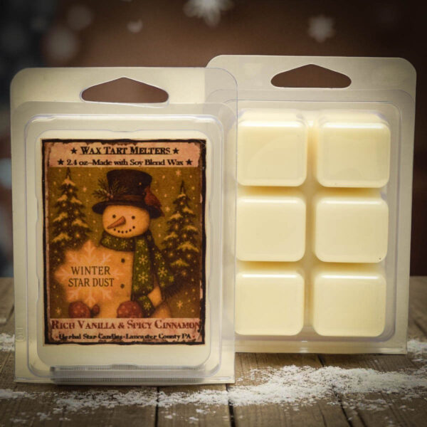 Clamshell pack of Winter Star Dust mini wax tart cubes with snowman label, scented with vanilla and cinnamon