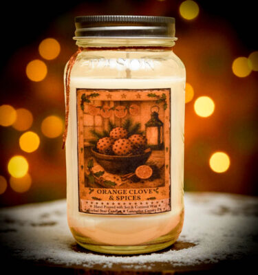 “24 oz Orange Clove Candle in Old Look Mason Jar with vintage tin lid, folk-art label, hand-poured by Herbal Star Candles in Lancaster County, PA”