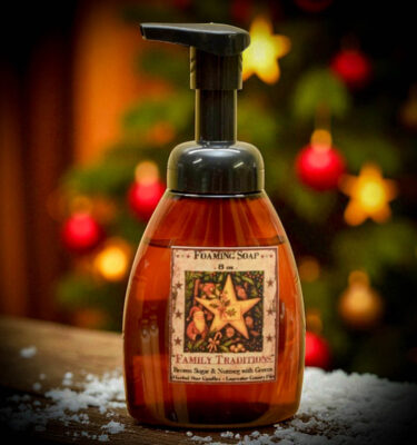 Family Traditions Foaming Soap, formerly Christmas Traditions, in 8 oz amber pump bottle with folk-art holiday label. Brown sugar, nutmeg & pine scent.