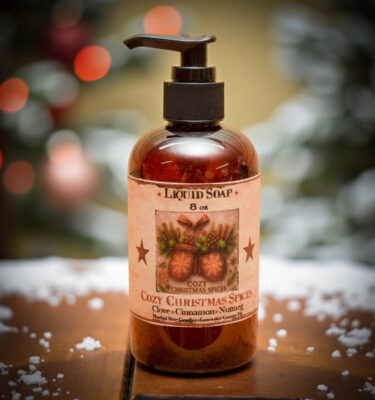 Cozy Christmas Spices Liquid Soap – 8 oz amber bottle with folk-art holiday label featuring clove, cinnamon, and nutmeg