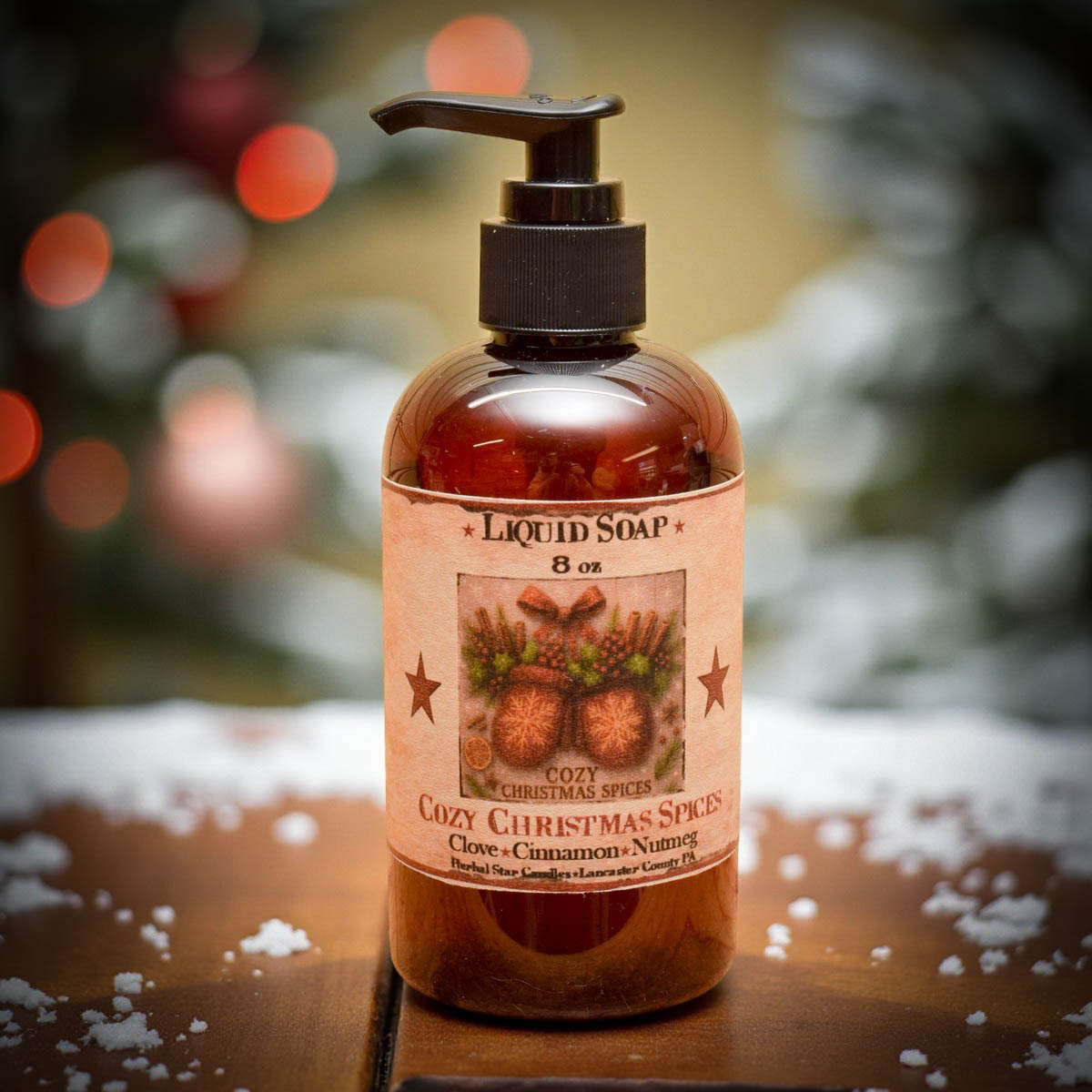 Cozy Christmas Spices Liquid Soap – 8 oz amber bottle with folk-art holiday label featuring clove, cinnamon, and nutmeg
