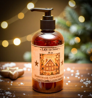 Homemade Gingerbread liquid hand soap 8 oz amber pump bottle with gingerbread house label.