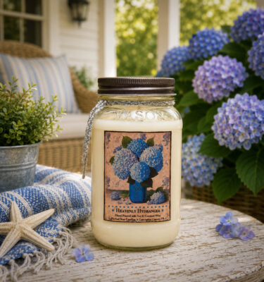 Heavenly Hydrangea 24 oz candle in a mason jar featuring fresh hydrangea blooms, soft powdery florals, and gentle coastal air fragrance.