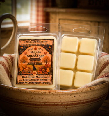 Bed and Breakfast Mini Tarts wax melts displayed in a rustic farmhouse mixing bowl with vintage kitchen decor.