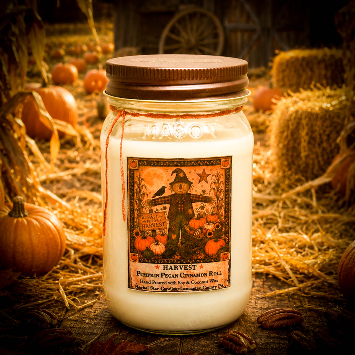 Harvest Candle 16 oz mason jar with antique bronze lid featuring a pumpkin pecan cinnamon roll fragrance